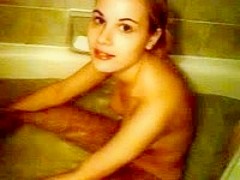 Bathtub fun for a naked teenager