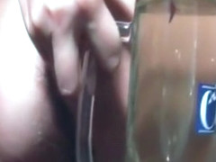 Chick pisses in a glass and rips a few farts