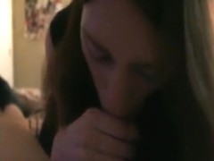 Brunette girl, wearning cat ears, sucks her bf pov on the bed.