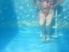Underwater vid showing a peek of pussy & tits