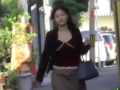 Slender sweetie flashes her booty when some stranger lifts her mini skirt