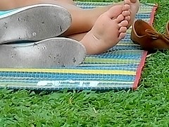 Candid asian soles in park