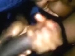 Busty black girlfriend jerking off my big black dick on cam