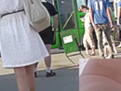 Blonde-haired girl with slender forms in upskirts video