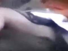 Voyeur tapes an asian girl couple fucking on the pavement in public