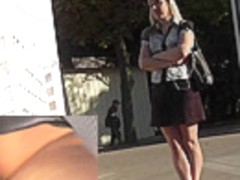 Sexy upskirt black panties of the girl on the bus stop