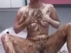 Big Boobs Dame Bathing In Candy