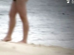 Hidden beach camera video of attractive nudist men and women