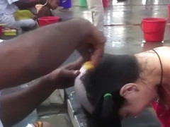 Russian woman headshave at Tirupati