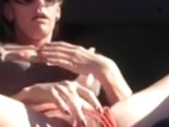 Redhead masturbates in car