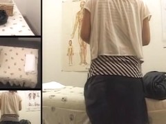 Japanese babe with nice tits enjoys a massage on spy cam