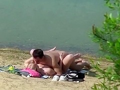 Spying on a wild pair fucking by the lake