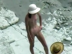 2 nudists love fucking on the beach.