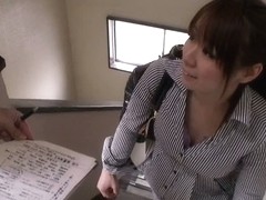 While an Asian peach it reading, someone is filming her tits