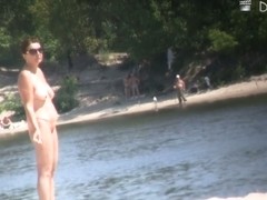 Amateur chicks give bodies to sun and to voyeur camera