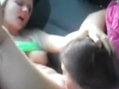 Teen eats out her hot shaved gf in the car