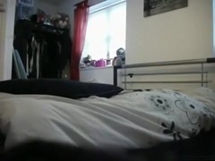 Brunette sucks her vibrator and masturbates with it