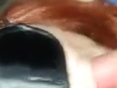 Redhead wife has oral sex with a mask