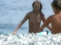 Horny voyeur loves to spy on nude people on the beach.