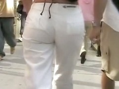 Gorgeous round ass in semi-transparent pants