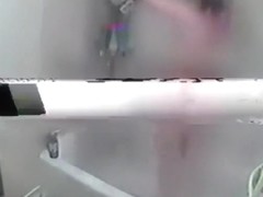 Voyeur tapes a hot skinny girl showering