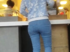 Sweet brunette with ass in tight jeans