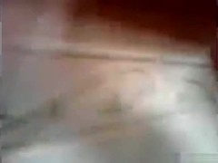 Latina fingers her hairy pussy in the shower