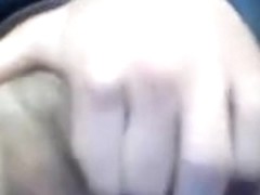 Mature babe rubs her pussy.