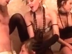 Retro blonde stuffs stick in girl's ass