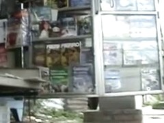 Newspaper stand upskirt video of a hot brunette