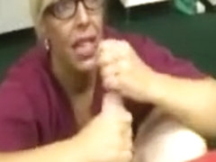 Mature nurse gives a handjob to her horny patient