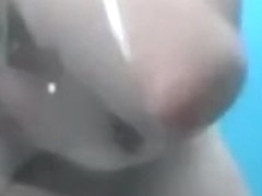 My wonderful girl takes a shower exposing her body