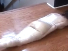 Plasticwrapped mummified girl